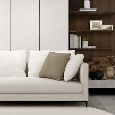 The cushions that are also available in a cream white and brown on a white sofa 