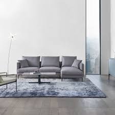 Notting 280cm x 188cm Corner Sofa in  'Mortar' fabric in a living room that has a vertical window going up to the ceiling